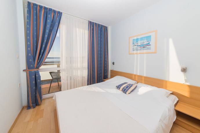 Imagen de la habitación del Hotel Aparthotel Roccia. Foto 10