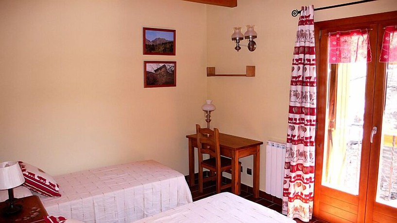 Imagen de la habitación del Hotel Aparthotel Spa Areu. Foto 9