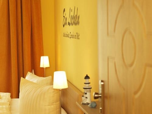 Imagen de la habitación del Hotel Aparthotel Strandhus. Foto 8