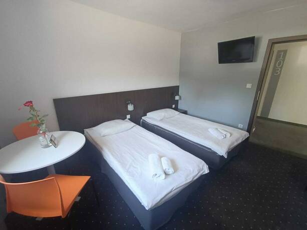 Imagen de la habitación del Hotel Aparthotel Strefa Budget. Foto 17