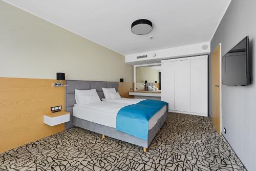 Imagen de la habitación del Hotel Aparthotel Termy Uniej&oacute;w. Foto 9
