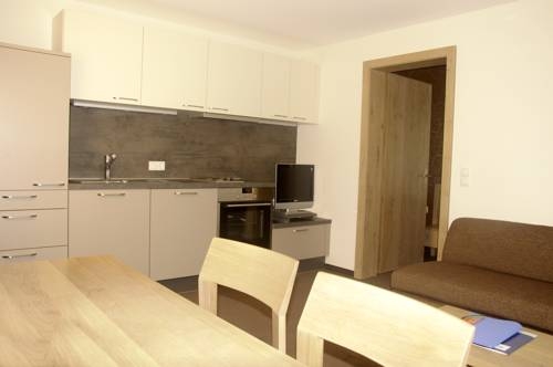 Imagen de la habitación del Hotel Aparthotel Tschanun Garni. Foto 49