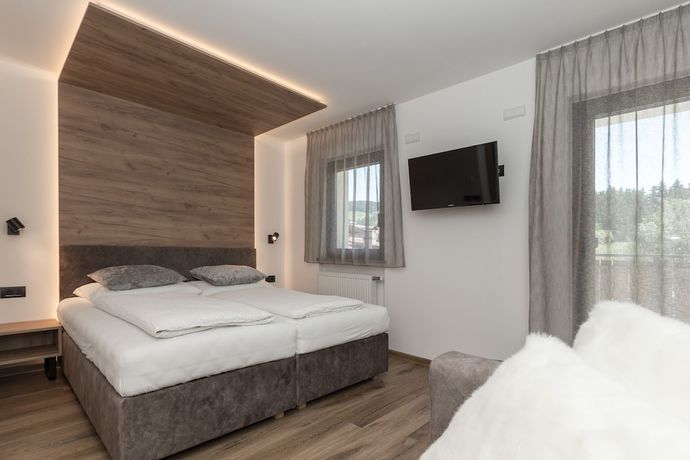 Imagen de la habitación del Hotel Aparthotel Winklwiese. Foto 15