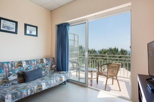 Imagen de la habitación del Hotel Aparthotel Xic. Foto 10