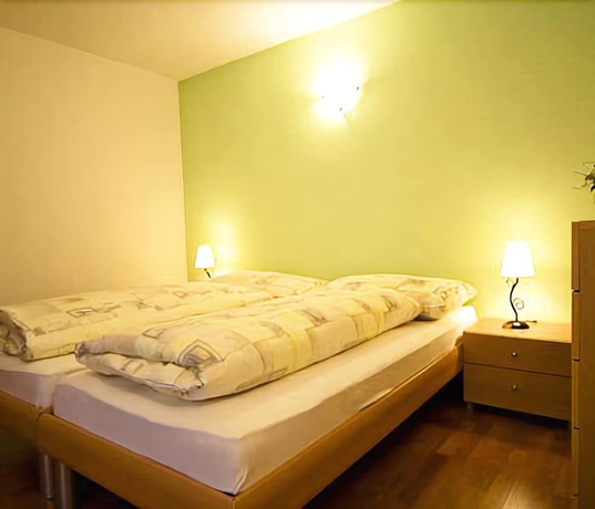 Imagen de la habitación del Hotel Aparthotel dala Leukerbad. Foto 16