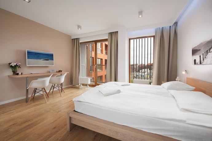 Imagen de la habitación del Hotel Apartinfo Island Apartments. Foto 13