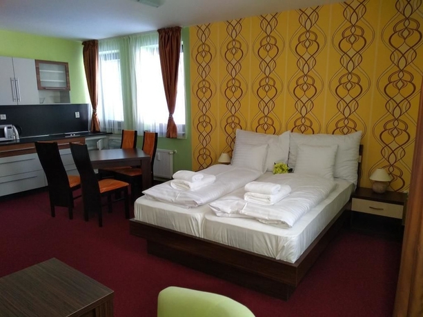Imagen de la habitación del Hotel Apartm&aacute;nov&yacute; Dom Fam&iacute;lia Smokovec. Foto 5