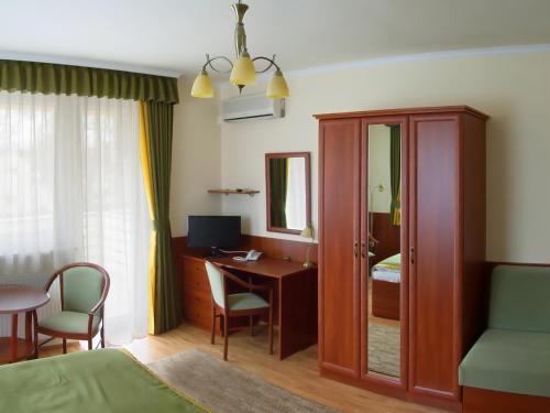 Imagen de la habitación del Hotel Apartman Bella. Foto 7