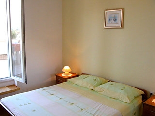 Imagen de la habitación del Hotel Apartman Marina II. Foto 6