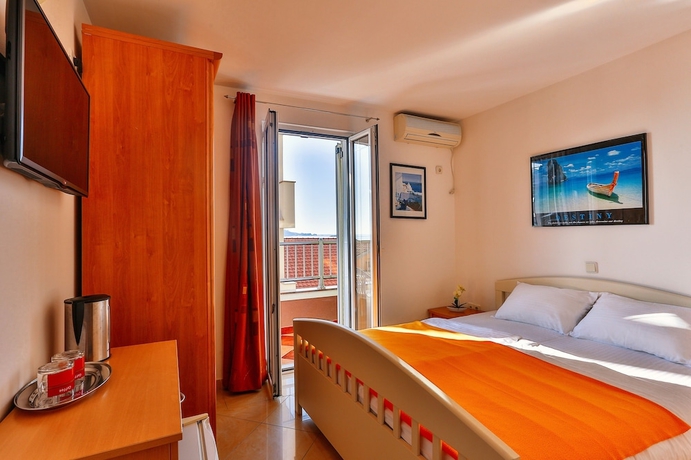 Imagen de la habitación del Hotel Apartmani Luka - Vila Brzulović. Foto 4