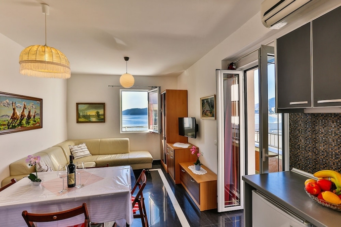 Imagen de la habitación del Hotel Apartmani Luka - Vila Brzulović. Foto 8