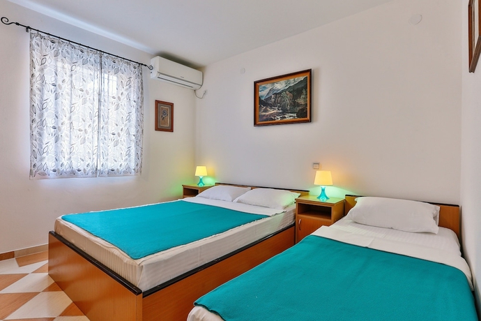 Imagen de la habitación del Hotel Apartmani Luka - Vila Brzulović. Foto 10