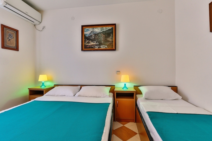 Imagen de la habitación del Hotel Apartmani Luka - Vila Brzulović. Foto 11