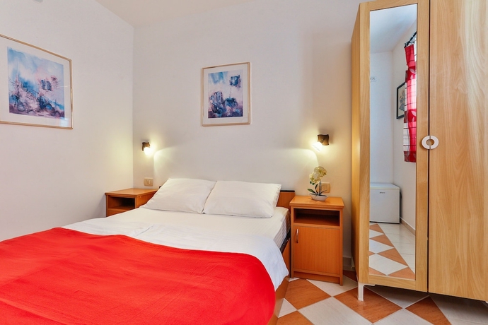 Imagen de la habitación del Hotel Apartmani Luka - Vila Brzulović. Foto 12