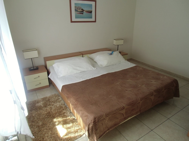 Imagen de la habitación del Hotel Apartmani Romano. Foto 5
