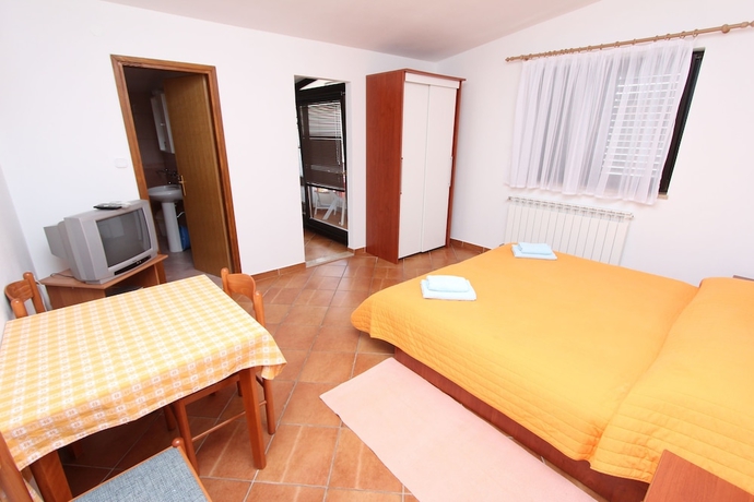 Imagen de la habitación del Hotel Apartmani Romano. Foto 12