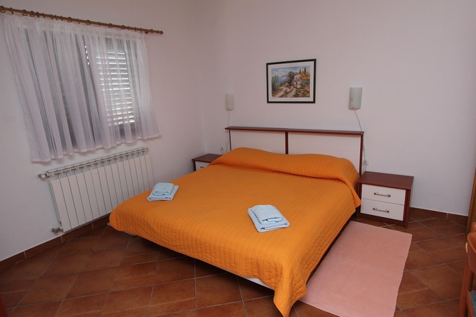 Imagen de la habitación del Hotel Apartmani Romano. Foto 13