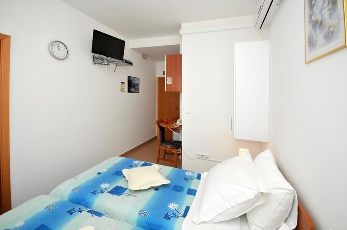 Imagen de la habitación del Hotel Apartmani Trogir. Foto 8