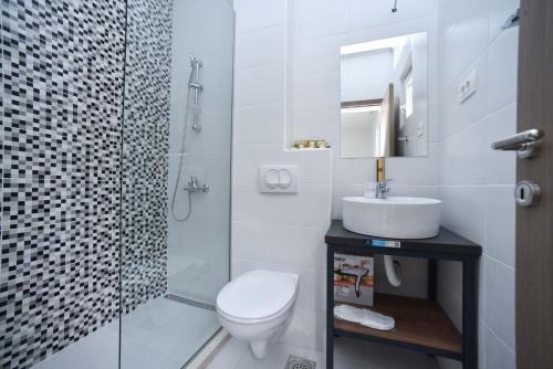 Imagen de la habitación del Hotel Apartment L Palace. Foto 7