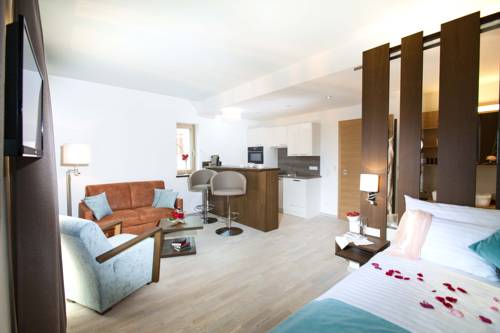 Imagen de la habitación del Hotel Apartmenthotel 's Mitterndorf. Foto 6