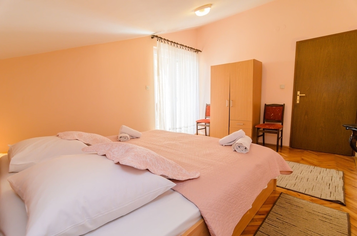 Imagen de la habitación del Hotel Apartments Amico. Foto 2