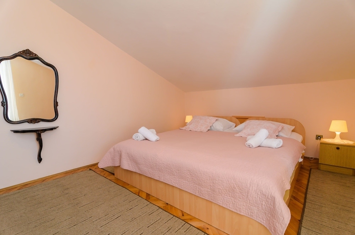 Imagen de la habitación del Hotel Apartments Amico. Foto 6