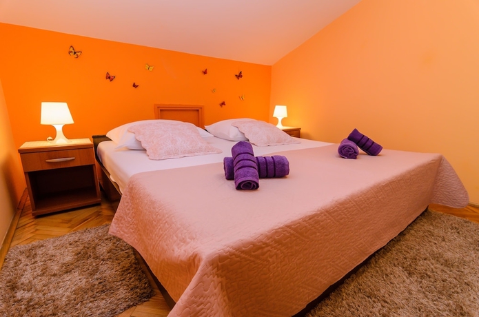 Imagen de la habitación del Hotel Apartments Amico. Foto 8