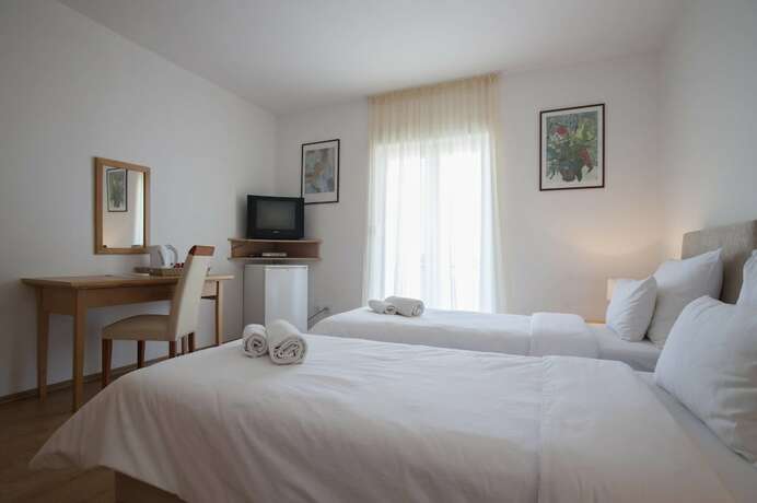 Imagen de la habitación del Hotel Apartments Djurasevic. Foto 11