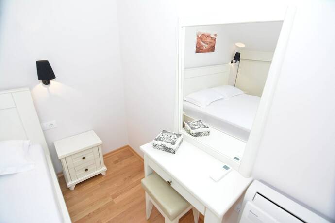 Imagen de la habitación del Hotel Apartments Dobrotski Dvori. Foto 18