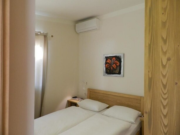 Imagen de la habitación del Hotel Apartments Erica Lux. Foto 12