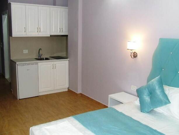 Imagen de la habitación del Hotel Apartments Flower Residence. Foto 14