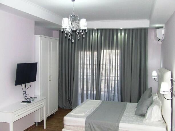 Imagen de la habitación del Hotel Apartments Flower Residence. Foto 19