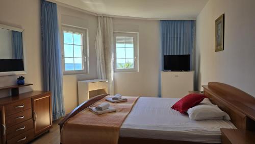 Imagen de la habitación del Hotel Apartments GIOVANNI (by the sea). Foto 12