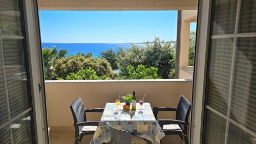 Imagen de la habitación del Hotel Apartments GIOVANNI (by the sea). Foto 13