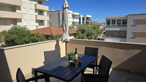 Imagen de la habitación del Hotel Apartments GIOVANNI (by the sea). Foto 15