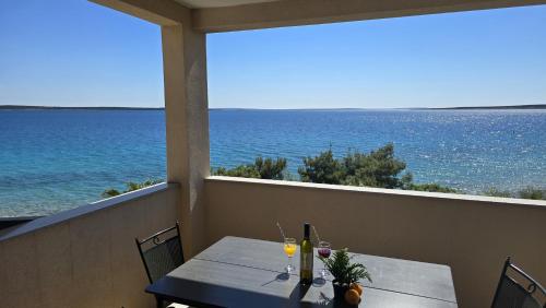 Imagen de la habitación del Hotel Apartments GIOVANNI (by the sea). Foto 18