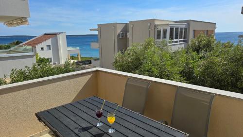 Imagen de la habitación del Hotel Apartments GIOVANNI (by the sea). Foto 19