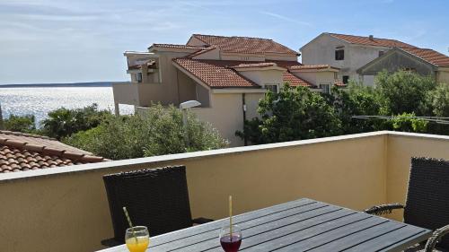 Imagen de la habitación del Hotel Apartments GIOVANNI (by the sea). Foto 20
