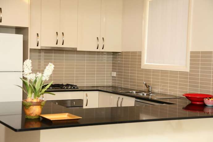 Imagen del bar/restaurante del Hotel Apartments On The Park. Foto 18