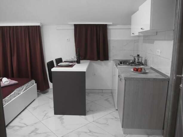 Imagen de la habitación del Hotel Apartments Paradis. Foto 13
