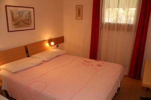 Imagen de la habitación del Hotel Apartments Residence Montana. Foto 10