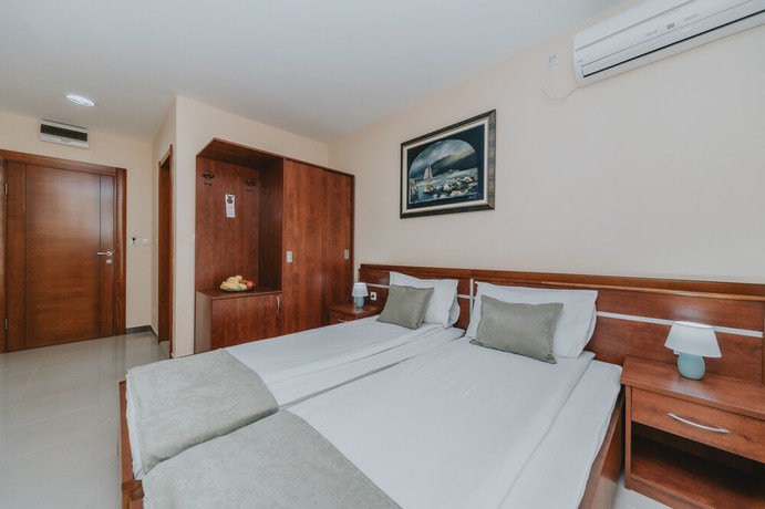 Imagen de la habitación del Hotel Apartments Salus. Foto 4