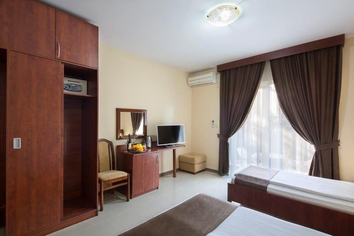 Imagen de la habitación del Hotel Apartments Salus. Foto 7