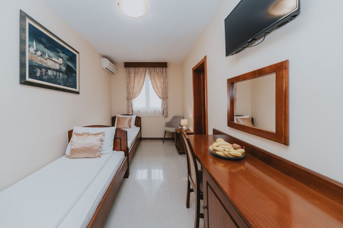 Imagen de la habitación del Hotel Apartments Salus. Foto 11