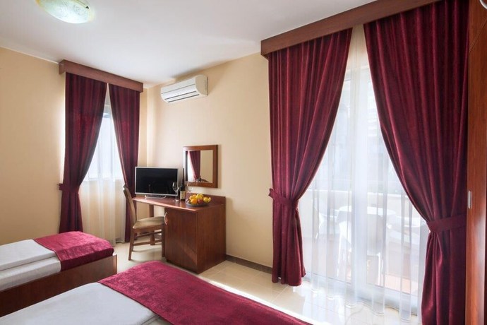 Imagen de la habitación del Hotel Apartments Salus. Foto 12