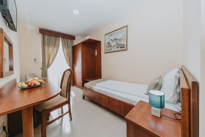 Imagen de la habitación del Hotel Apartments Salus. Foto 14