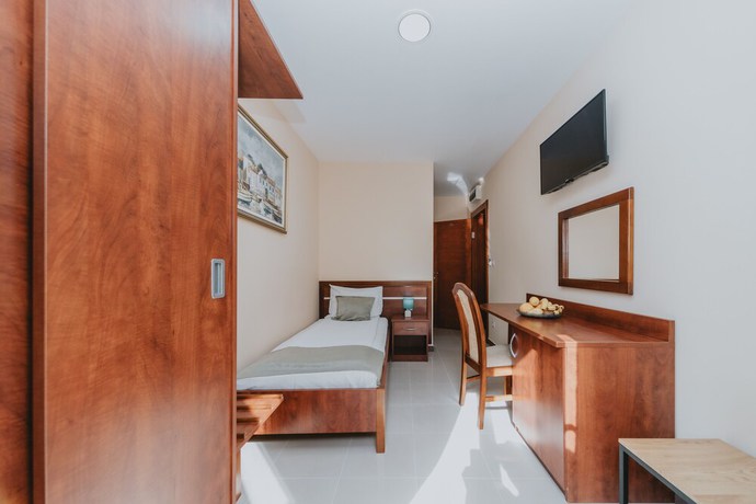 Imagen de la habitación del Hotel Apartments Salus. Foto 15