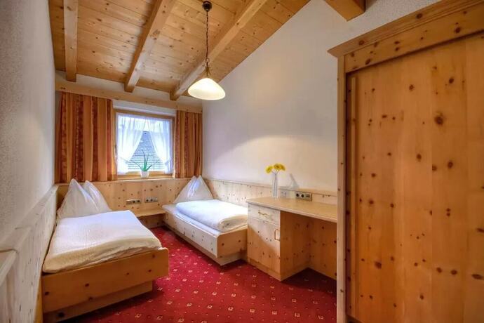 Imagen de la habitación del Hotel Apartments Sonnenau - Greidererhof. Foto 11