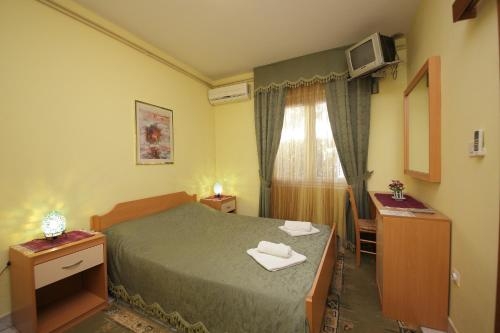 Imagen de la habitación del Hotel Apartments Tamara. Foto 7