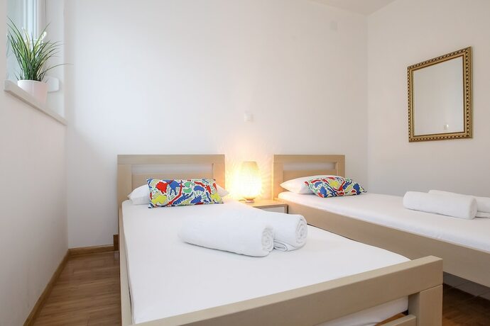 Imagen de la habitación del Hotel Apartments Tomana. Foto 17